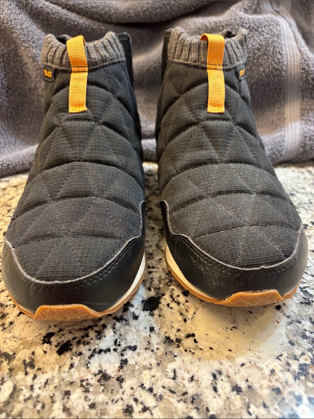 Teva  Black Quilted Slip-On Ankle Boots with Yellow Pull Tabs - Picture 2 of 5